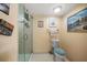 Bathroom with toilet and walk-in shower at 690 Island Way # 812, Clearwater Beach, FL 33767
