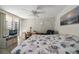 Main bedroom with a king-size bed, desk and TV at 690 Island Way # 812, Clearwater Beach, FL 33767
