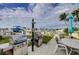 Community patio features grills, seating and waterfront views at 690 Island Way # 812, Clearwater Beach, FL 33767