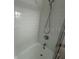 Simple bathroom with a shower and tile surround at 5945 21St N St # 14, St Petersburg, FL 33714