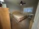 Spacious bedroom with carpeted floors and neutral decor at 5945 21St N St # 14, St Petersburg, FL 33714