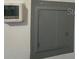 Utility closet with thermostat and access panel at 5945 21St N St # 14, St Petersburg, FL 33714
