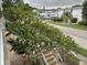 View of building exterior and landscaping from balcony at 5945 21St N St # 14, St Petersburg, FL 33714