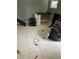 Spare bedroom with desk, fan and a black trash bag at 5122 Lillilea Ln, New Port Richey, FL 34653
