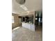 Kitchen with marble island and view into living room at 5122 Lillilea Ln, New Port Richey, FL 34653