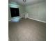 bedroom with crib and tiled floor at 5122 Lillilea Ln, New Port Richey, FL 34653