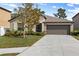 Charming one-story home with a two-car garage at 12907 Wildflower Meadow Dr, Riverview, FL 33579