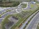 Aerial view of community farm with parking and walking paths at 17399 Nectar Flume Dr, Land O Lakes, FL 34638