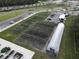 Community garden with greenhouse and raised beds at 17399 Nectar Flume Dr, Land O Lakes, FL 34638