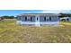 Charming one-story home featuring a well-manicured front yard and covered crawl space at 5302 Turkey Creek Rd, Plant City, FL 33567