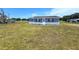 Charming one-story home featuring a well-manicured front yard and covered crawl space at 5302 Turkey Creek Rd, Plant City, FL 33567