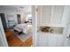 Well-lit bedroom closet with double hanging rods and shelving at 6203 N Flora Vista Ave, Tampa, FL 33604