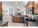 Open kitchen boasts stainless steel appliances and overlooks the Gathering room at 10211 Cleghorn Dr, San Antonio, FL 33576