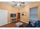 Versatile bedroom with wood flooring and plenty of natural light at 10211 Cleghorn Dr, San Antonio, FL 33576