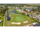 Aerial view of home situated near golf course at 10211 Cleghorn Dr, San Antonio, FL 33576