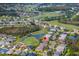 Aerial view of home on golf course community at 10211 Cleghorn Dr, San Antonio, FL 33576