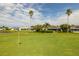 View of the golf course from the property at 10211 Cleghorn Dr, San Antonio, FL 33576