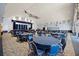 Banquet hall with stage and round tables for events at 10211 Cleghorn Dr, San Antonio, FL 33576