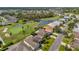 Aerial view showing home's proximity to golf course at 10211 Cleghorn Dr, San Antonio, FL 33576