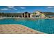 Large resort-style pool with surrounding lounge chairs at 10211 Cleghorn Dr, San Antonio, FL 33576