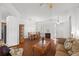 Bright living room with tiled floors and comfy seating at 10211 Cleghorn Dr, San Antonio, FL 33576