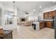Open kitchen with an island and modern appliances at 10211 Cleghorn Dr, San Antonio, FL 33576