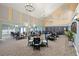 Bright dining room with multiple tables and chairs at 10211 Cleghorn Dr, San Antonio, FL 33576