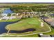 Aerial view showcasing home's golf course location at 10211 Cleghorn Dr, San Antonio, FL 33576