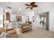Living area with access to kitchen and screened lanai at 10211 Cleghorn Dr, San Antonio, FL 33576