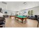 Relaxing game room featuring two billiard tables at 10211 Cleghorn Dr, San Antonio, FL 33576