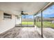 Relaxing screened porch overlooking backyard at 3510 Allandale Dr, Holiday, FL 34691