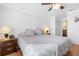 Main bedroom with a king-size bed and two nightstands at 18593 Bridle Club Dr, Tampa, FL 33647