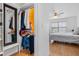 Bedroom with mirrored closet and a view into another bedroom at 18593 Bridle Club Dr, Tampa, FL 33647