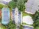 Community features tennis court, playground, and sand volleyball court at 18593 Bridle Club Dr, Tampa, FL 33647