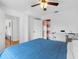 Spacious bedroom with built-in shelving and a large closet at 18593 Bridle Club Dr, Tampa, FL 33647