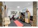 Home gym with exercise bike and weights at 18593 Bridle Club Dr, Tampa, FL 33647
