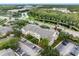 Aerial view of apartment building, highlighting its location and parking at 18593 Bridle Club Dr, Tampa, FL 33647