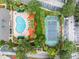 Community pool and tennis courts are shown in this overhead view at 18593 Bridle Club Dr, Tampa, FL 33647