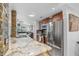 Modern kitchen featuring granite countertops and stainless steel appliances at 18593 Bridle Club Dr, Tampa, FL 33647