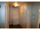 Hallway with built-in storage cabinets and wood-look flooring at 5302 Turkey Creek Rd, Plant City, FL 33567