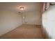 Living room with carpet flooring and built-in shelving at 5302 Turkey Creek Rd, Plant City, FL 33567