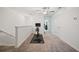 Bright loft area with exercise equipment and ceiling fan at 17399 Nectar Flume Dr, Land O Lakes, FL 34638