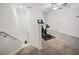 Loft area with exercise equipment and additional space at 17399 Nectar Flume Dr, Land O Lakes, FL 34638