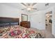 Spacious bedroom with ceiling fan and built-in dresser at 17399 Nectar Flume Dr, Land O Lakes, FL 34638