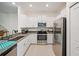 Modern kitchen with stainless steel appliances and granite countertops at 17399 Nectar Flume Dr, Land O Lakes, FL 34638