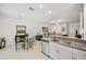 Modern kitchen with island and stainless steel appliances at 17399 Nectar Flume Dr, Land O Lakes, FL 34638
