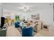 Open concept living space with kitchen and dining area visible at 17399 Nectar Flume Dr, Land O Lakes, FL 34638