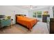 Main bedroom with large window and plenty of closet space at 17399 Nectar Flume Dr, Land O Lakes, FL 34638