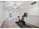 Spacious loft area with exercise bike and access to other rooms at 17399 Nectar Flume Dr, Land O Lakes, FL 34638