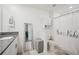 Main bathroom with double vanity and shower at 17399 Nectar Flume Dr, Land O Lakes, FL 34638